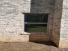 Atlanta Builders and Remodeling installed windows into a brick basement - After